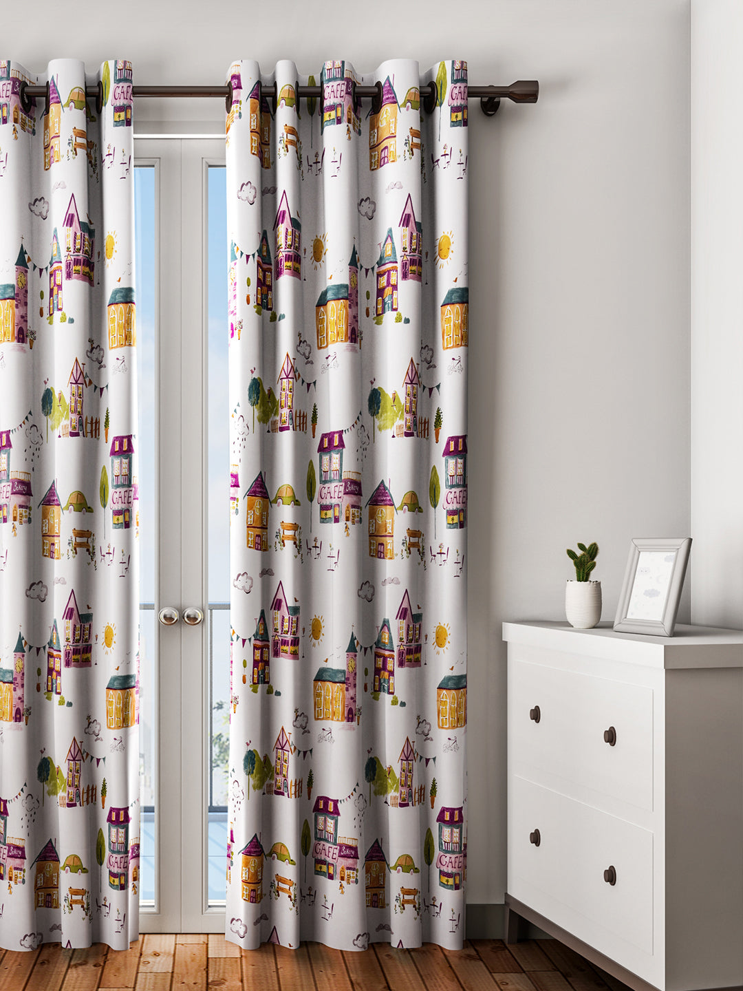 URBAN DREAM KIDS CITY PRINT ORANGE AND PURPLE EYELET CURTAIN